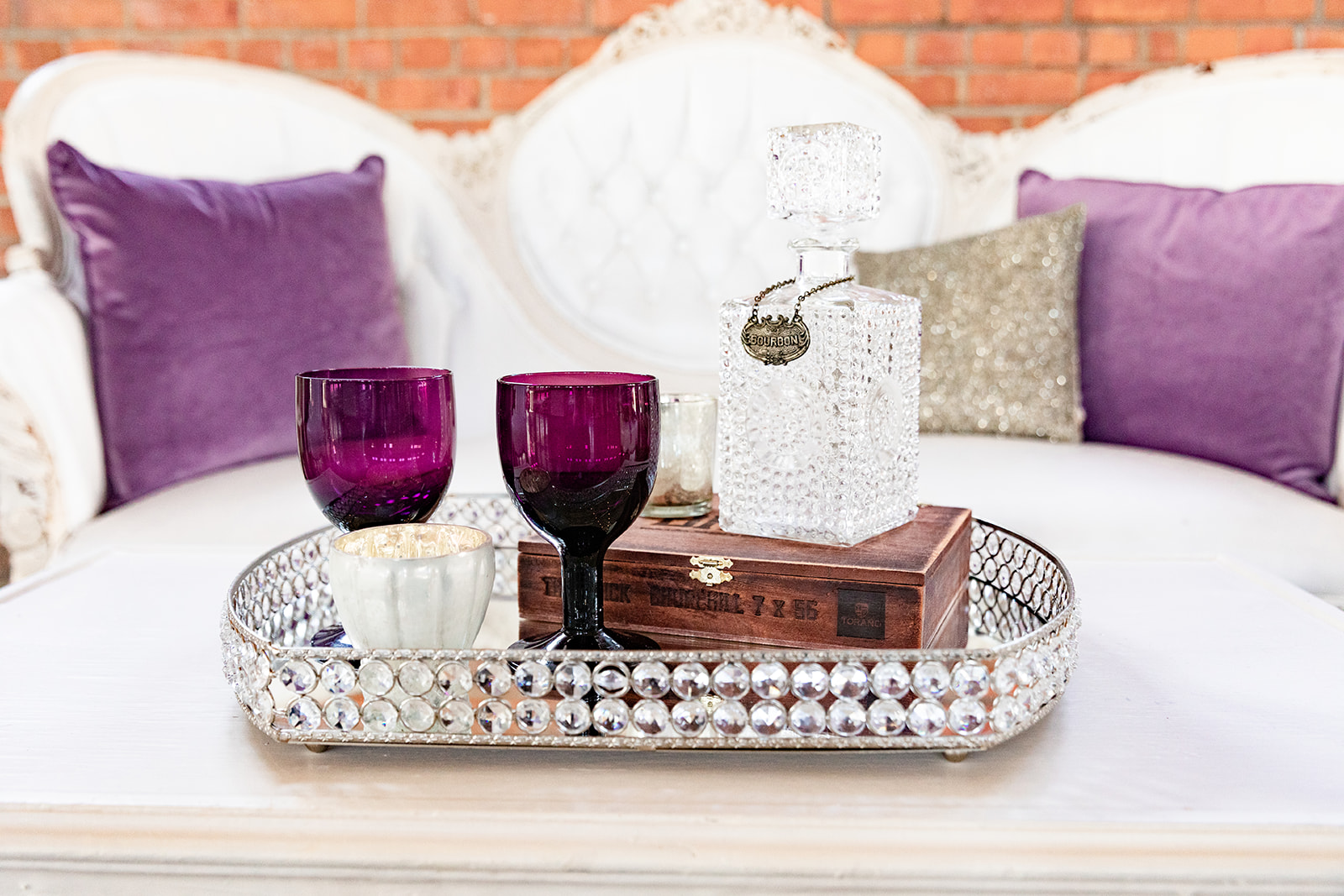 bourbon decanter, purple goblets