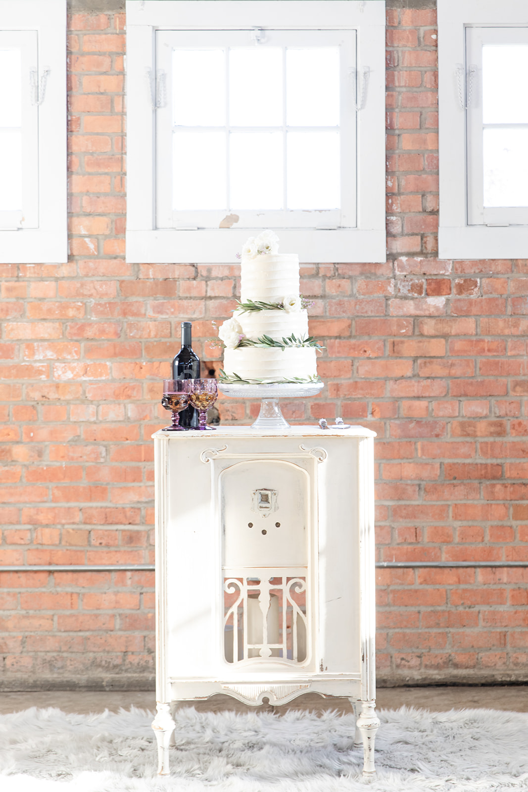 three tier wedding cake, wine